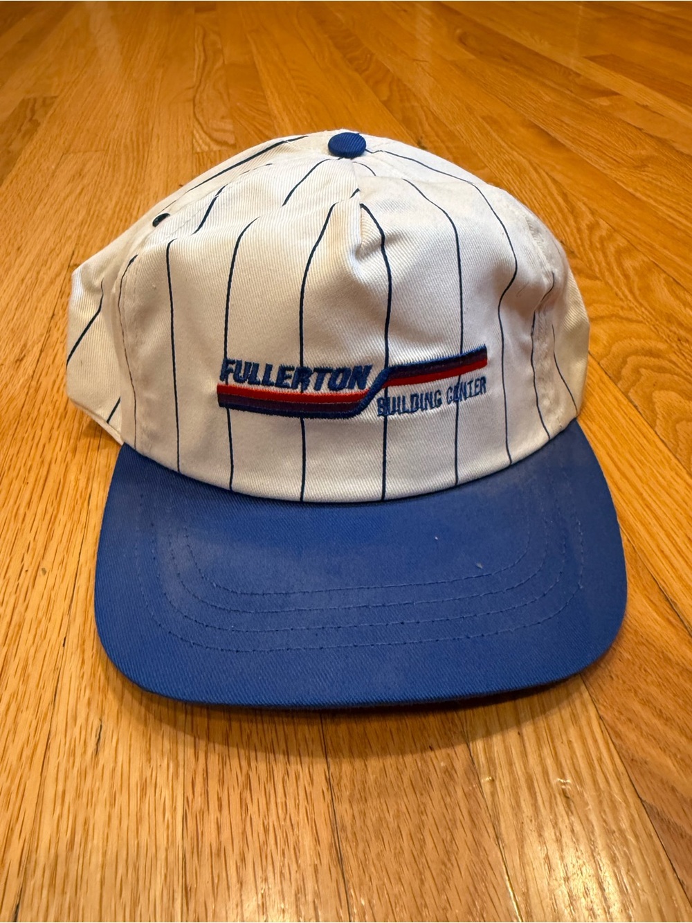 Fullerton Building Center White Pinstripe Cap with Blue Brim